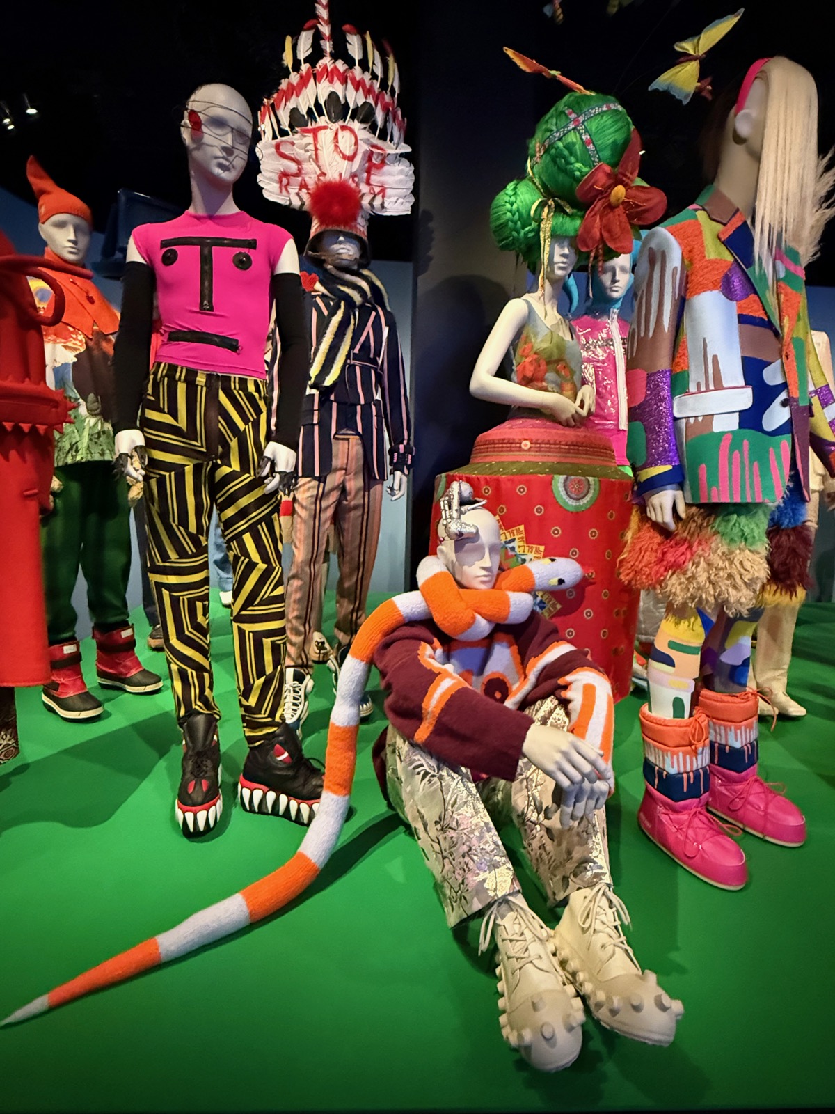 Walter Van Beirendonck's room: brightly coloured mannequins with painted faces and topiary-like hair.