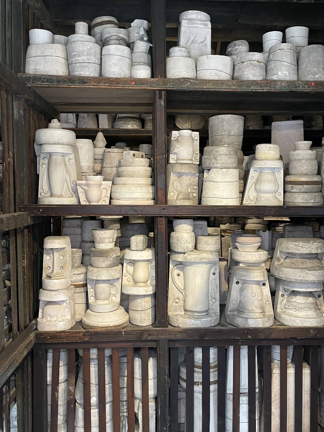 Shelves filled with plaster pottery moulds at Burleigh's Middleport Pottery.