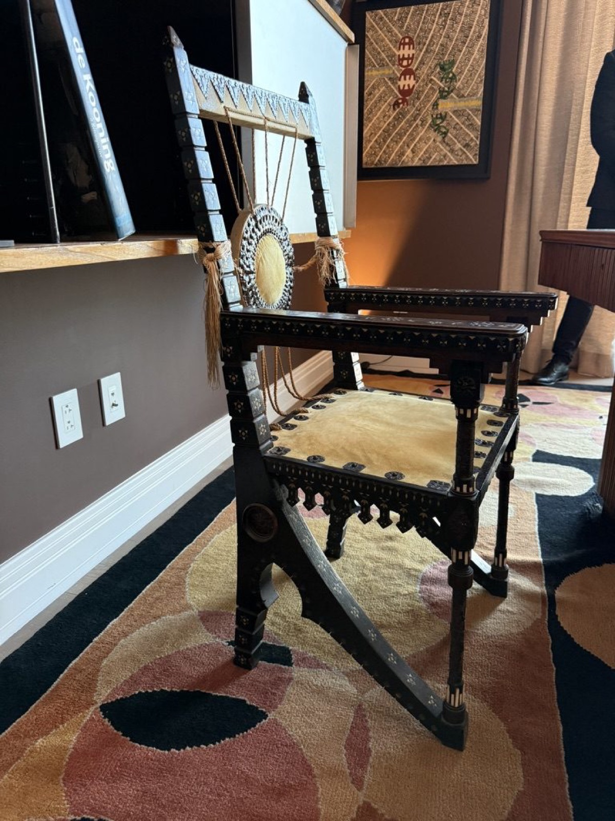 A Carlo Bugatti armchair in ebonised walnut with copper, bone and pewter inlay, c.1910.